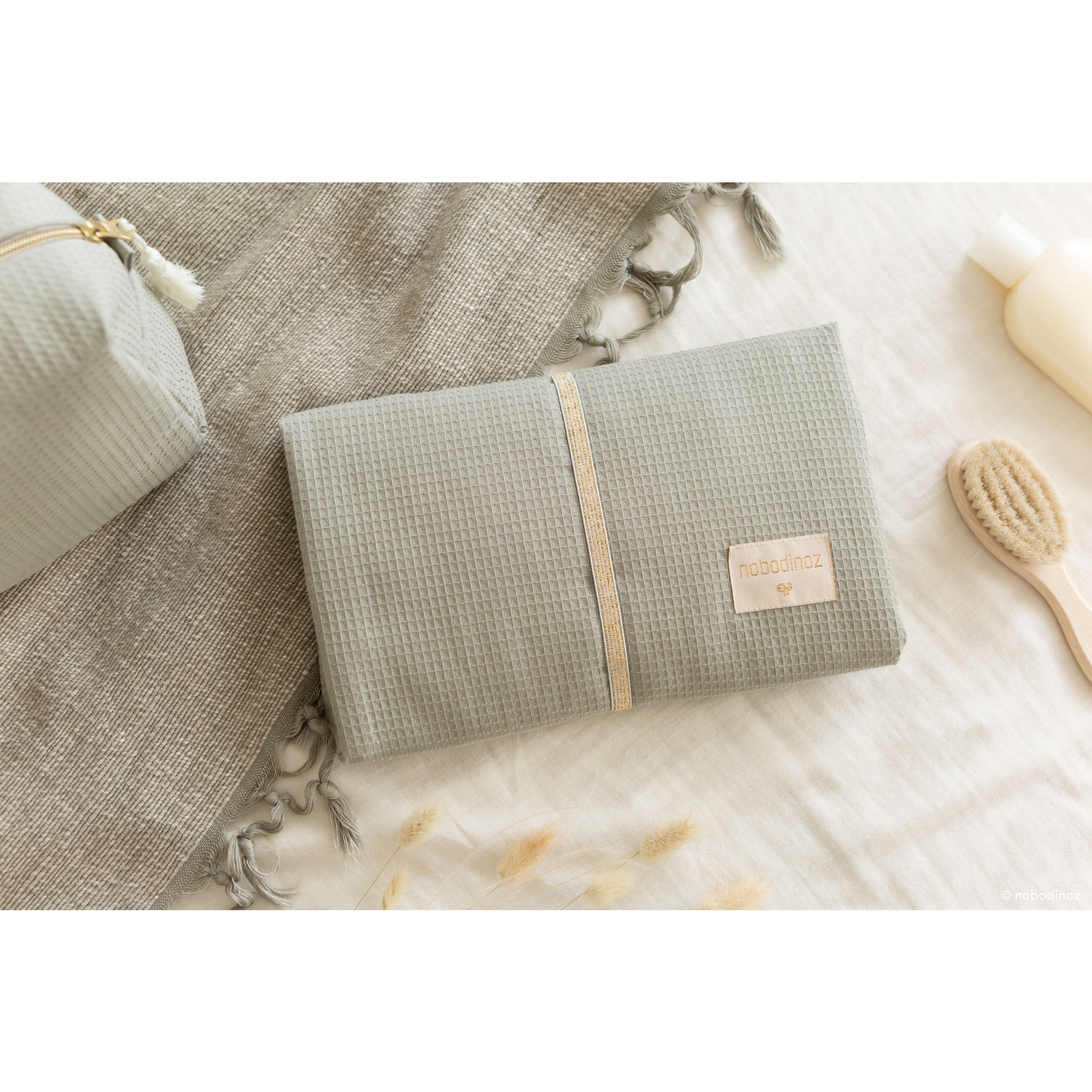 Tapis a langer nomad laurel